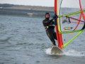 Lekker dik aan gekleed winter surfen. Helaas viel de wind al weg.