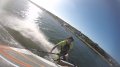 Mooie foto, tegen de schittering op het water van de zon in: Laydown gijp.